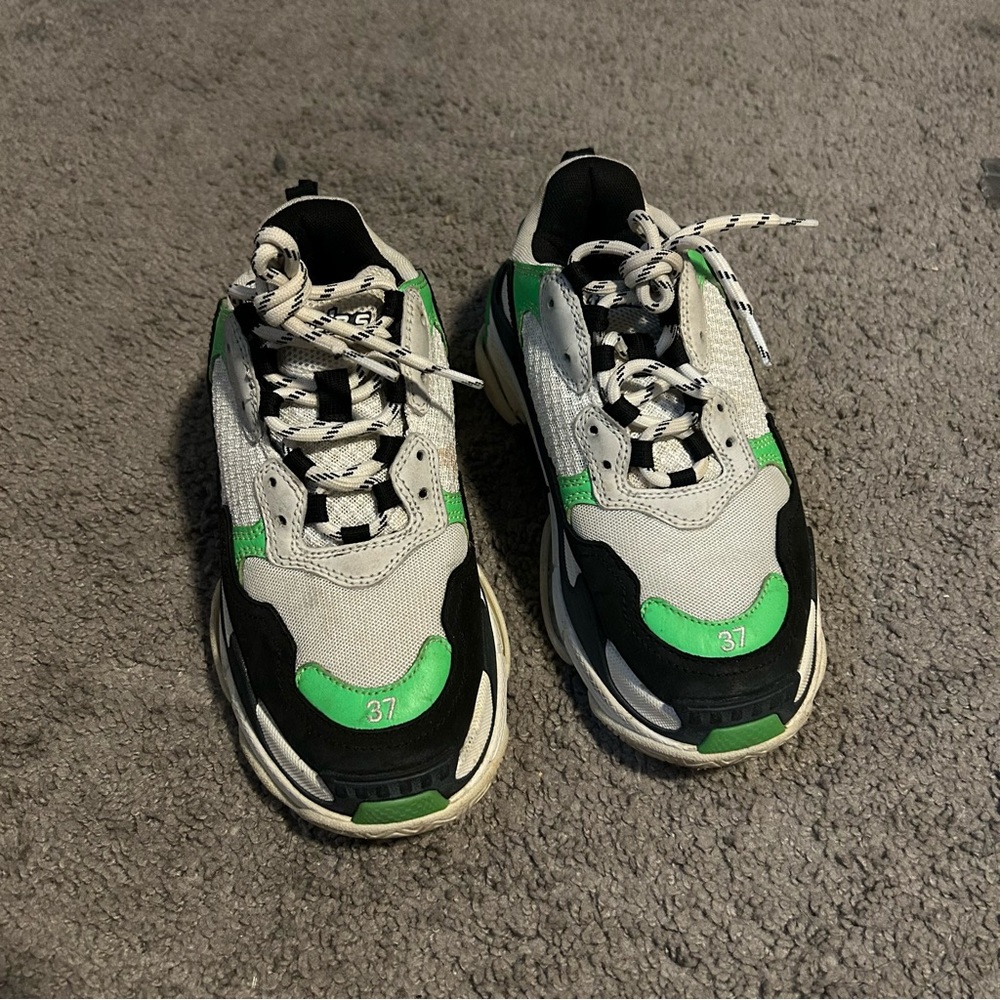 Balenciaga triple S. Worn. Has stain in the front